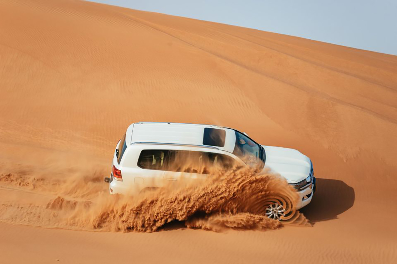 Dubai: Dune Buggy, 4x4 dune bashing, Sandboarding, Camel Ride, BBQ Camp Dinner