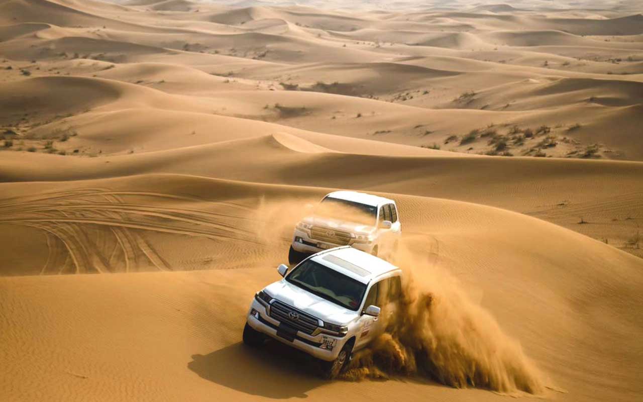 Private Quad Bike Safari, 4x4 Dune bashing, Sandboarding, Camel ride, BBQ Camp Dinner